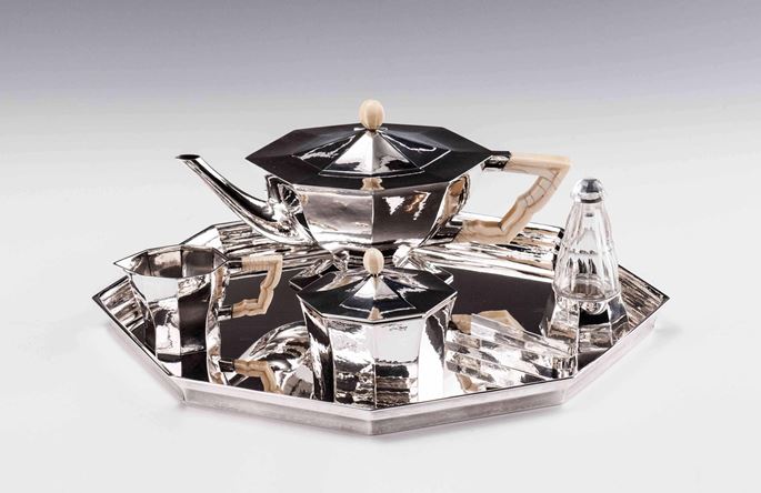 Eduard Josef Wimmer-Wisgrill - SILVER TEA SERVICE consisting of: teapot, creamer, covered sugar bowl, sugar tongs, rum flacon, tray  | MasterArt